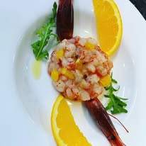 Polpo e patate tiepido con limone e prezzemolo